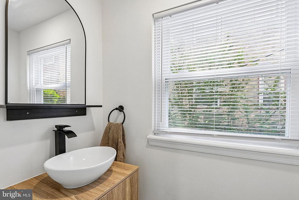 Photo 13 — Bath, vessel sink