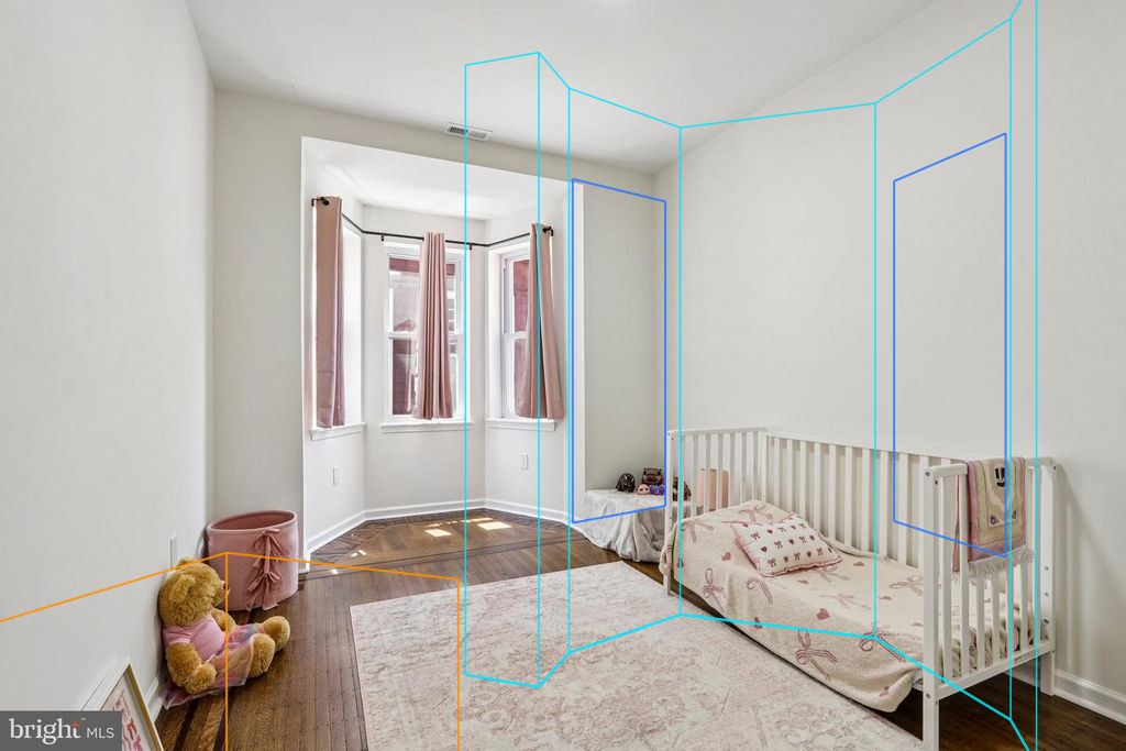 Photo 26 — Nursery with the plan's walls, windows and furniture projected through the fitted camera