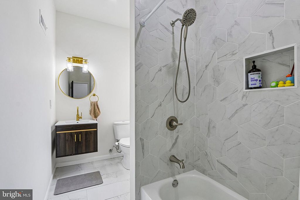 Photo 29 — Bathroom, tub + shower