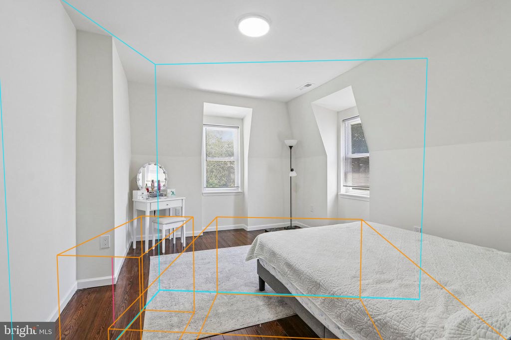 Photo 33 — Floor 3 bedroom with the plan's walls, windows and furniture projected through the fitted camera