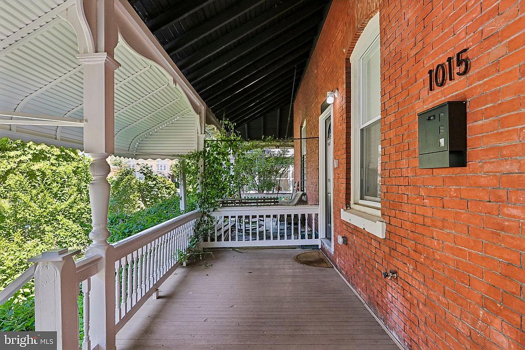 Photo 46 — Front porch, house number 1015